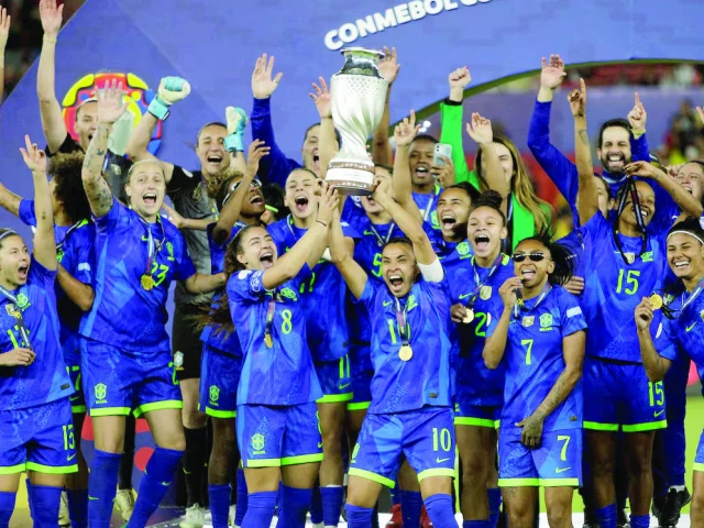 brazil s marta and angelina lift the trophy as they celebrate with teammates after winning women s copa america 2025 photo reuters