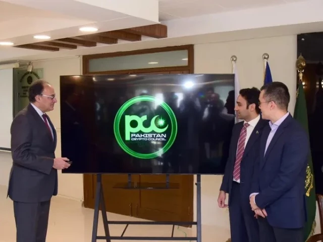 finance minister muhammad aurangzeb left unveils logo of pakistan crypto council with binance founder changpeng zhao as council s strategic adviser in islamabad on april 7 2025 photo courtesy handout finance division