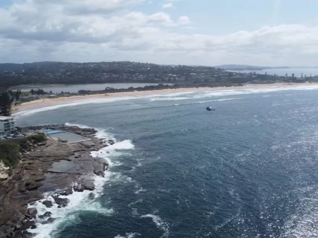 a drone view of long reef beach following an incident where a surfer died after being attacked by a large shark in dee why near sydney australia september 6 2025 in this screen grab obtained from social media video photo reuters