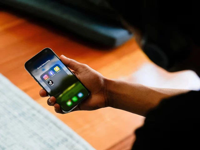 a high school student poses with his mobile phone showing his social media applications in melbourne australia photos reuters