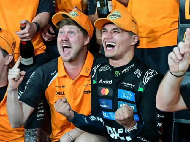 lando norris held on to clinch his maiden f1 world title in abu dhabi photo afp