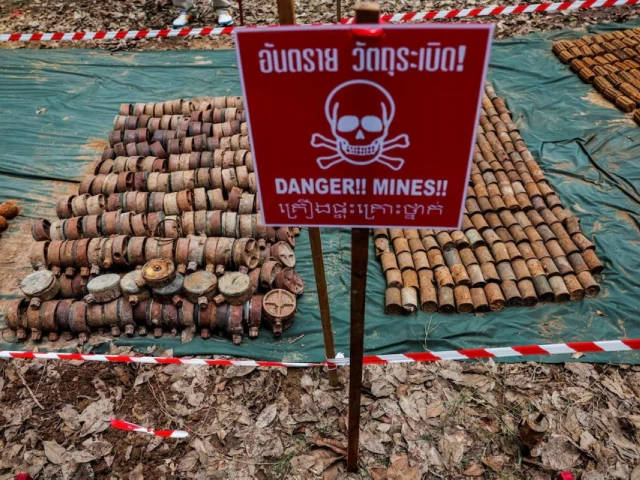old landmines that thailand says were detonated and recovered near the disputed border between thailand and cambodia are displayed during a media visit organized by the royal thai army following a ceasefire between cambodia and thailand in surin province thailand august 20 2025 photo reuters
