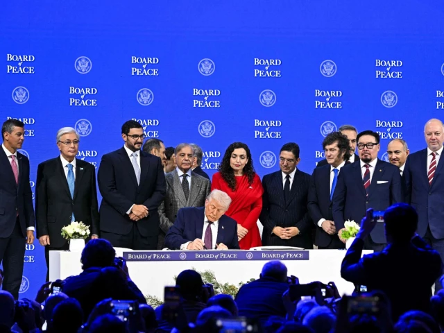 paraguay s president santiago pena l prime minister shehbaz sharif 5l kosovo s president vjosa osmani c r morocco s foreign minister nasser bourita 6r argentina s president javier milei 5r armenia s prime minister nikol pashinyan 2r bulgaria s former prime minister rosen zhelyazkov r turkiye s foreign minister hakan fidan 4r pose with us president donald trump signing a founding charter at the board of peace meeting during the world economic forum wef annual meeting in davos switzerland on thursday afp