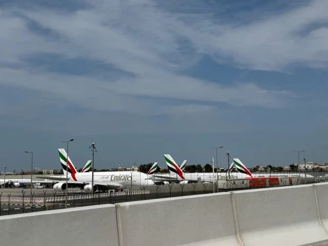 emirates planes sit on the tarmac of dubai international airport after two drones came down in the vicinity of the airport amid the us israeli conflict with iran in dubai united arab emirates on march 11 2026 photo reuters