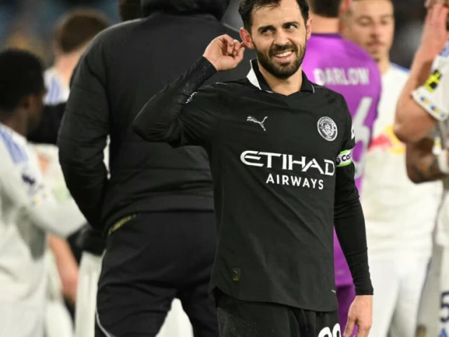 manchester city beat leeds 1 0 to close within two points of arsenal photo afp