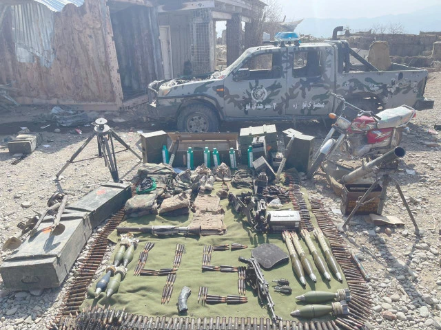 heavy arms and ammunition seized from retreating taliban forces are displayed amid ongoing operation ghazab lil haq