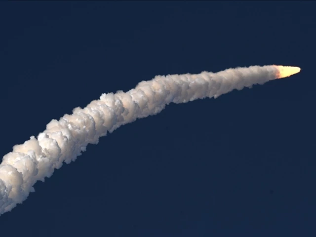a view of the artemis ii rocket as it blasts off into space leaving behind a trail of white smoke photo anadolu agency