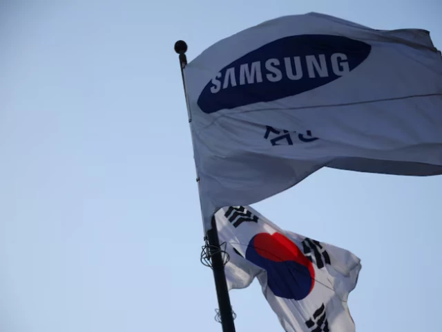 a flag bearing the logo of samsung electronics flutters at the company s office building in seoul south korea april 15 2025 photo reuters