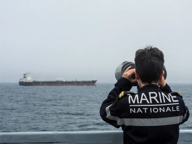 a french navy personnel observes an oil tanker subject to international sanctions and sailing from russia sailing in the atlantic ocean in this handout obtained by reuters on june 1 2026 photo reuters