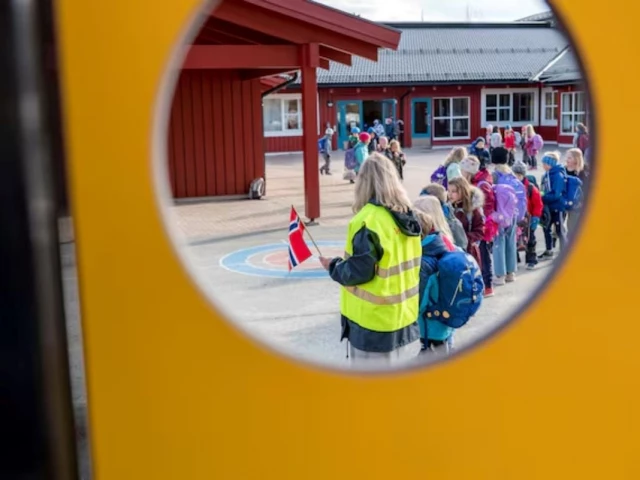 children stay in line at vikasen school in trondheim norway april 27 2020 photo reuters