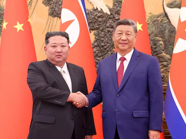 chinese president xi jinping and democratic people s republic of korea dprk leader kim jong un shake hands at the great hall of the people in beijing china september 4 2025 photo reuters