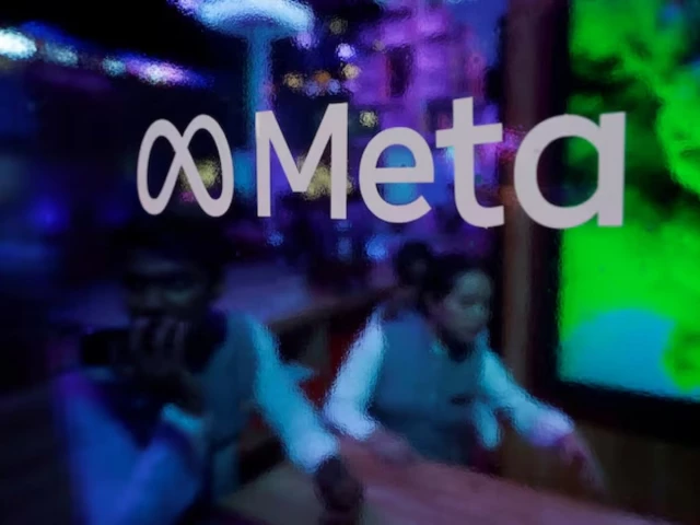 people are seen behind a logo of meta platforms during a conference in mumbai india september 20 2023 photo reuters
