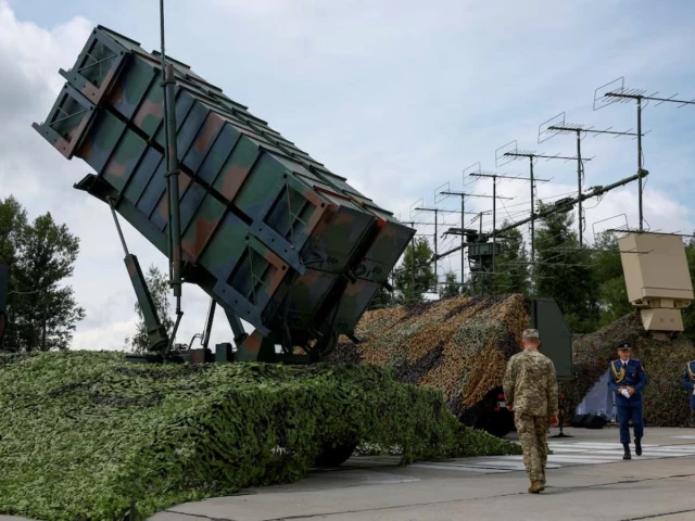 ukrainian service members walk next to a launcher of a patriot air defence system amid russia s attack on ukraine in an undisclosed location ukraine august 4 2024 photo reuters