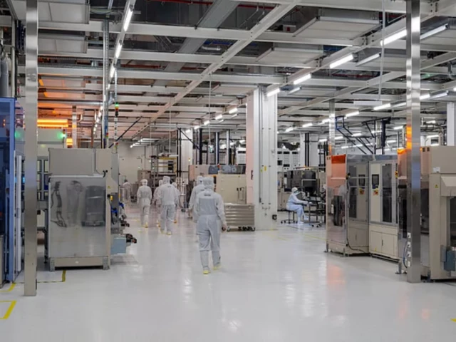 employees walk at the at s production facilities in leoben styria austria photo afp