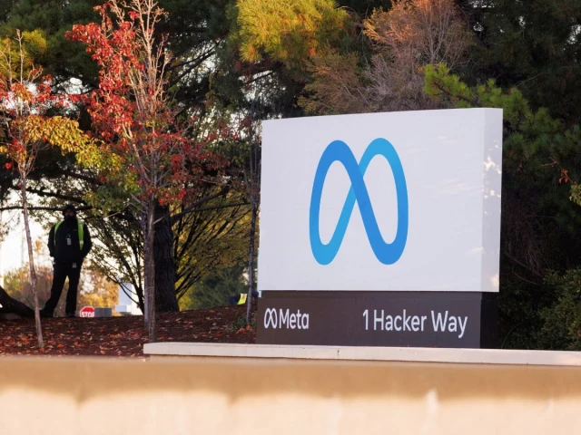 a security guard stands watch by the meta sign outside the headquarters of facebook parent company meta platforms inc in mountain view california us november 9 2022 photo reuters