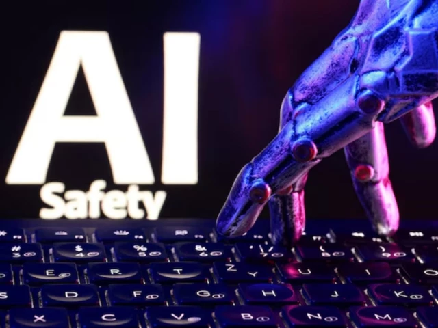 the words ai safety a keyboard and a robotic hand in this illustration taken september 23 2026 reuters
