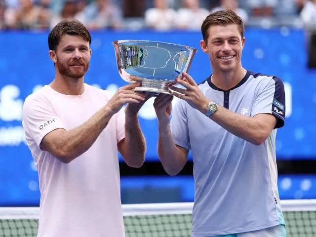 christian harrison left and neal skupski pose with their trophy after winning the men s doubles final match of the us open photo afp