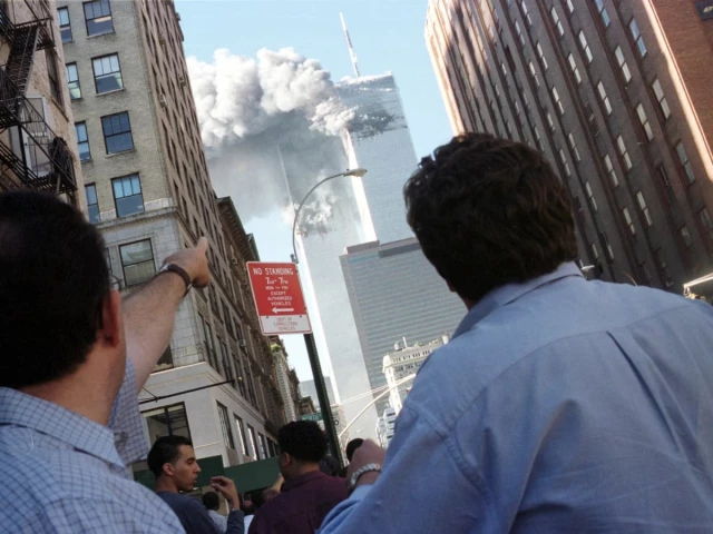 pedestrians react to the world trade centre collapse september 11 2001 photo reuters