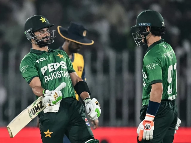 captain sahibzada farhan and maaz sadaqat share a 92 run stand against sri lanka at rawalpindi cricket stadium on friday photo afp