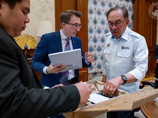 malaysian prime minister anwar ibrahim inspecting starlink kits photo anwar ibrahim x