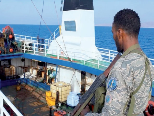 a puntland maritime police force soldier stands aboard the mt honour 25 oil tanker following its rescue off somalia photo x pmpfofficial